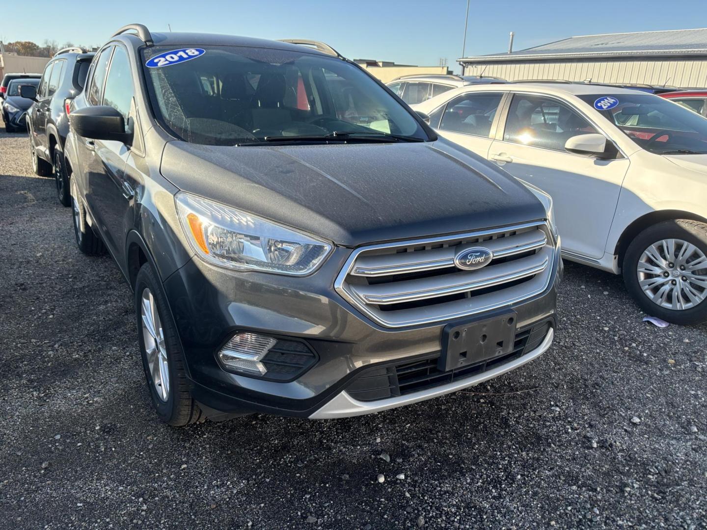 2018 GRAY Ford ESCAPE SE (1FMCU9G9XJU) with an Other engine, located at 15 Petro Dr, Warsaw, IN, 46582, (574) 306-0055, 41.273563, -85.857544 - 2018 Ford ESCAPE SE - Photo#1