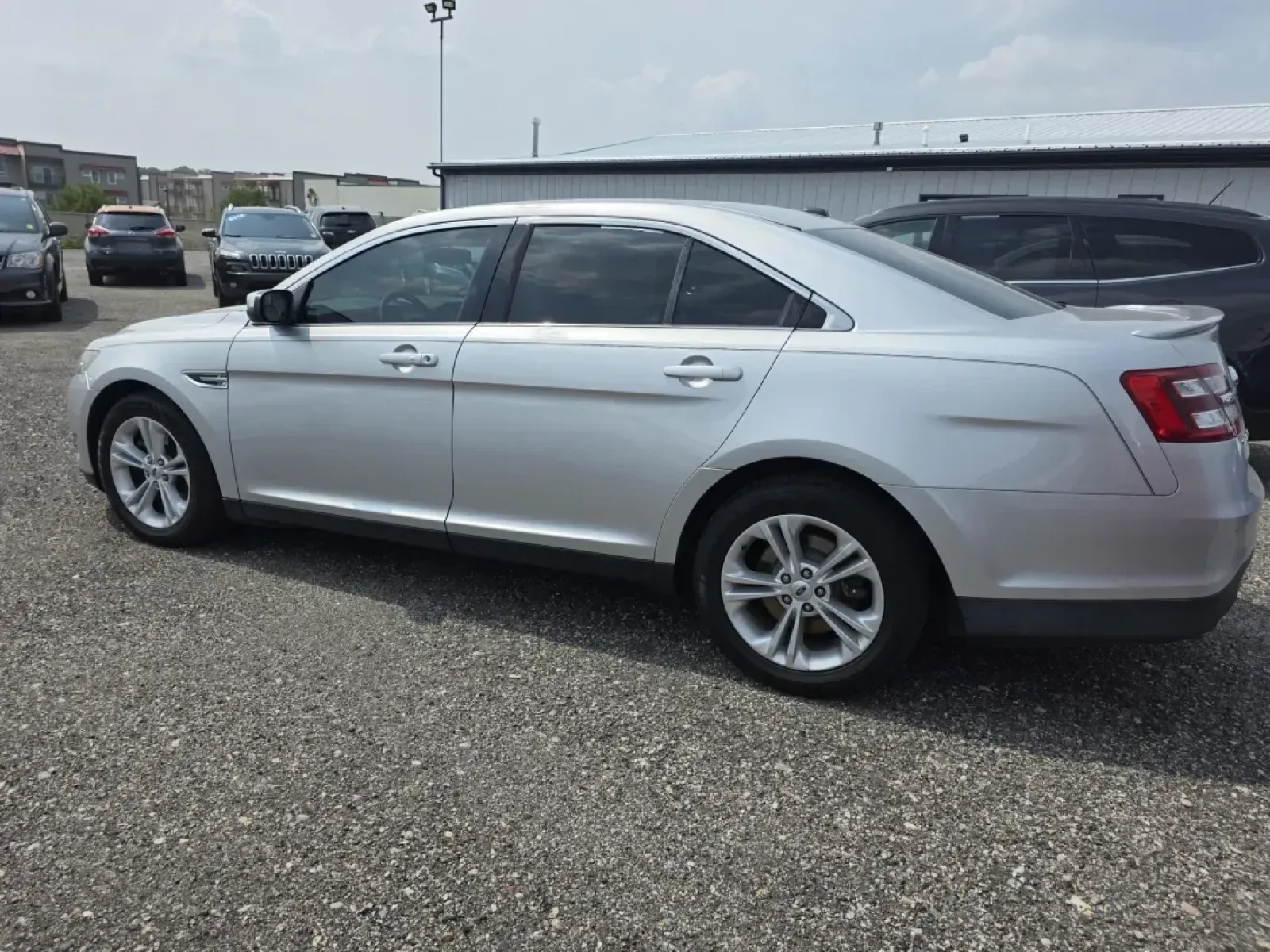 2015 SILVER Ford TAURUS SEL (1FAHP2E87FG) with an Other engine, located at 15 Petro Dr, Warsaw, IN, 46582, (574) 306-0055, 41.273563, -85.857544 - 2015 Ford TAURUS SEL - Photo#2