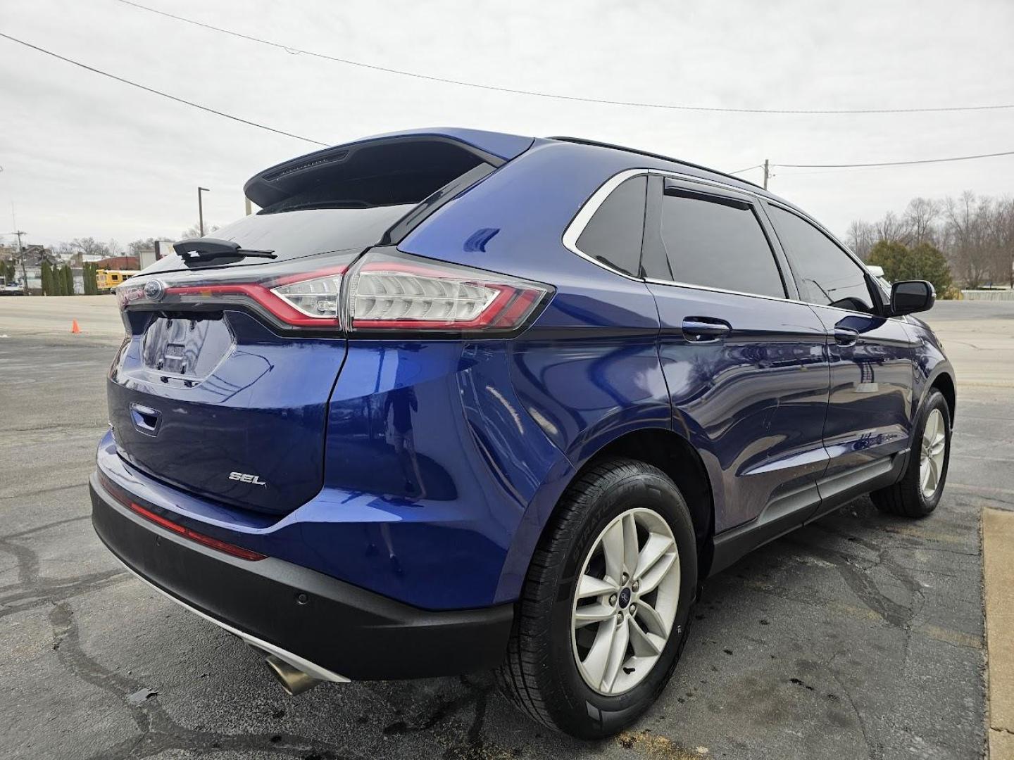 2015 BLUE /BLACK Ford EDGE SEL FWD (2FMTK3J83FB) with an 3.5L V6 DOHC 24V engine, 6-Speed Automatic transmission, located at 502 South Main Street, Columbia City, IN, 46725, (260) 244-4645, 41.151382, -85.490578 - 2015 Ford EDGE SEL FWD - Photo#3