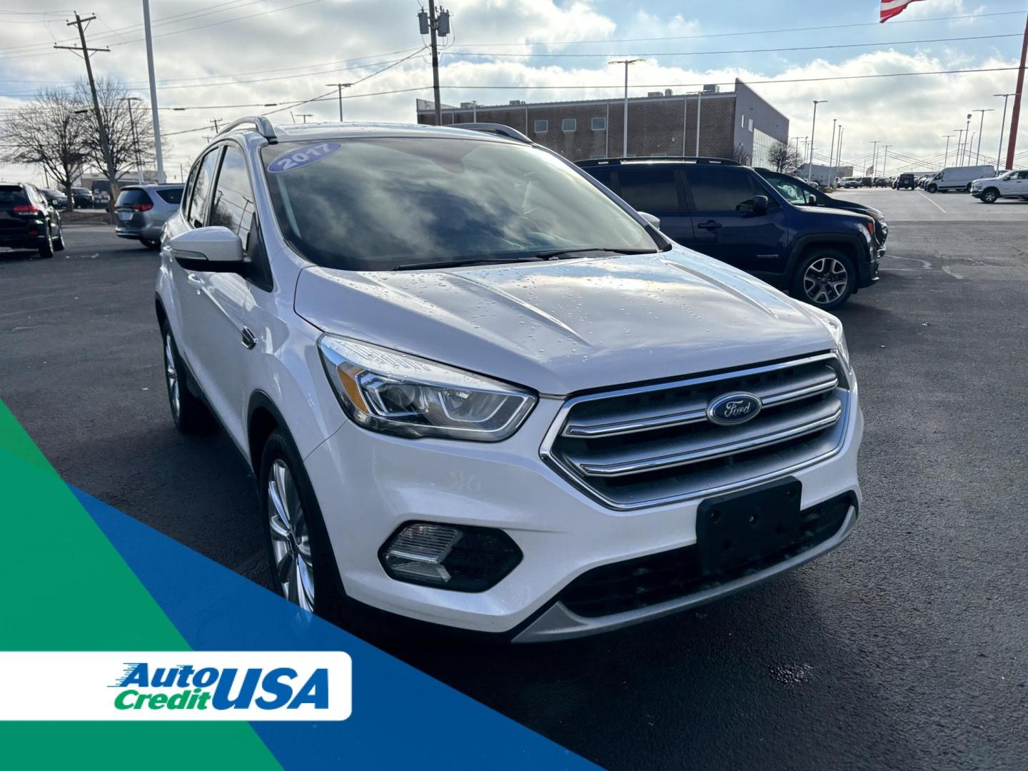 2017 WHITE Ford ESCAPE TITANIUM Titanium FWD (1FMCU0J9XHU) with an 2.0L L4 DOHC 16V engine, 6A transmission, located at 100 West Coliseum Boulevard, Fort Wayne, IN, 46805, (260) 471-0567, 41.118340, -85.141014 - 2017 Ford ESCAPE TITANIUM Titanium FWD - Photo#0
