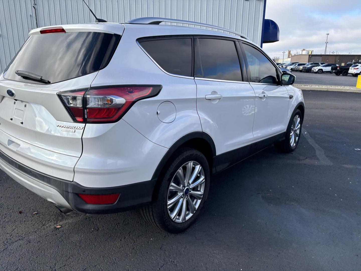 2017 WHITE Ford ESCAPE TITANIUM Titanium FWD (1FMCU0J9XHU) with an 2.0L L4 DOHC 16V engine, 6A transmission, located at 100 West Coliseum Boulevard, Fort Wayne, IN, 46805, (260) 471-0567, 41.118340, -85.141014 - 2017 Ford ESCAPE TITANIUM Titanium FWD - Photo#2