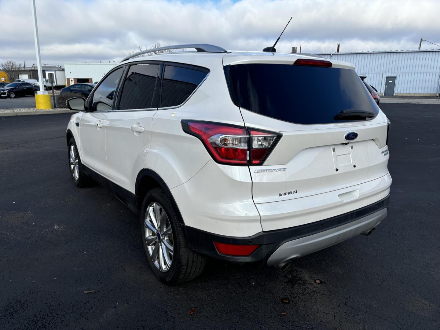 2017 WHITE Ford ESCAPE TITANIUM Titanium FWD (1FMCU0J9XHU) with an 2.0L L4 DOHC 16V engine, 6A transmission, located at 100 West Coliseum Boulevard, Fort Wayne, IN, 46805, (260) 471-0567, 41.118340, -85.141014 - 2017 Ford ESCAPE TITANIUM Titanium FWD - Photo#4