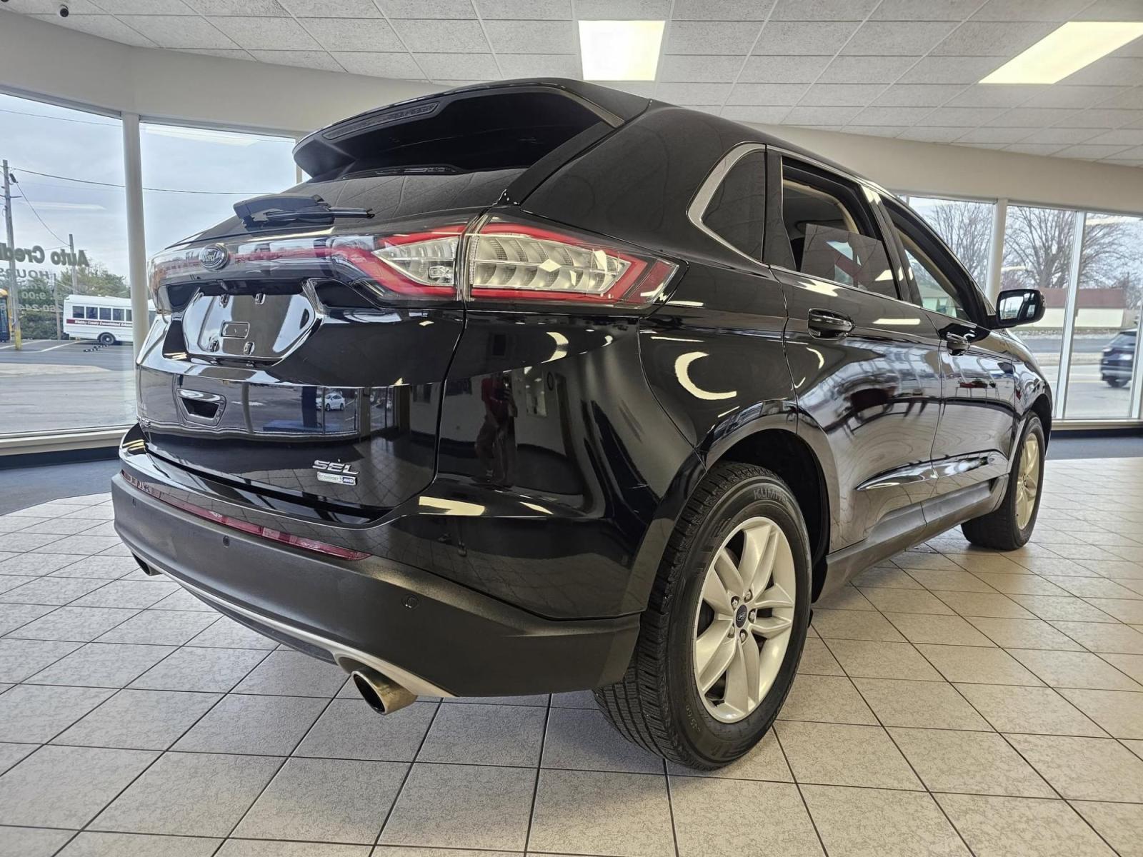 2016 /Black Ford Edge SEL AWD (2FMPK4J99GB) with an 2.0L L4 DOHC 16V engine, 6A transmission, located at 502 South Main Street, Columbia City, IN, 46725, (260) 244-4645, 41.151382, -85.490578 - 2016 Ford Edge SEL AWD - Photo#1