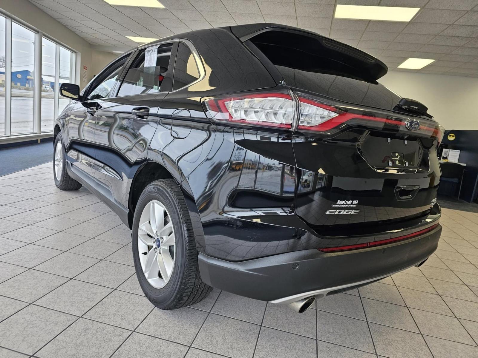 2016 /Black Ford Edge SEL AWD (2FMPK4J99GB) with an 2.0L L4 DOHC 16V engine, 6A transmission, located at 502 South Main Street, Columbia City, IN, 46725, (260) 244-4645, 41.151382, -85.490578 - 2016 Ford Edge SEL AWD - Photo#2