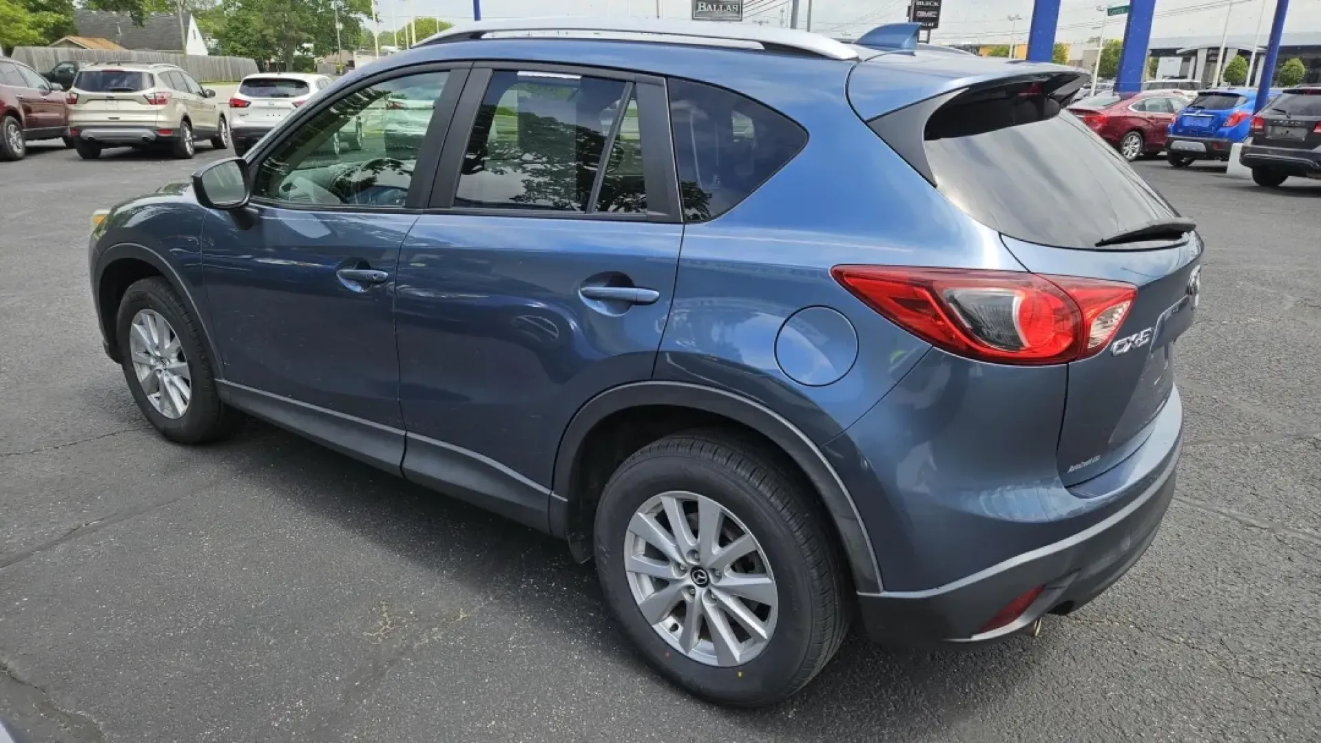 2015 Mazda CX-5 TOURING (JM3KE2CY0F0) with an Other engine, located at 5744 Central Avenue, Toledo, OH, 43615, (419) 724-0130, 41.676781, -83.682137 - **Discover Your Adventure with the 2015 Mazda CX-5 Touring at Auto Credit in Toledo, OH!**<br /> <br /> Are you ready to elevate your family outings or weekend adventures? The 2015 Mazda CX-5 Touring is the perfect blend of versatility and comfort, designed to meet the needs of today's active lifest - Photo#2