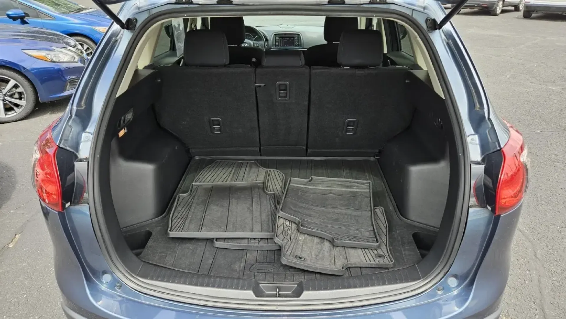 2015 Mazda CX-5 TOURING (JM3KE2CY0F0) with an Other engine, located at 5744 Central Avenue, Toledo, OH, 43615, (419) 724-0130, 41.676781, -83.682137 - **Discover Your Adventure with the 2015 Mazda CX-5 Touring at Auto Credit in Toledo, OH!**<br /> <br /> Are you ready to elevate your family outings or weekend adventures? The 2015 Mazda CX-5 Touring is the perfect blend of versatility and comfort, designed to meet the needs of today's active lifest - Photo#4