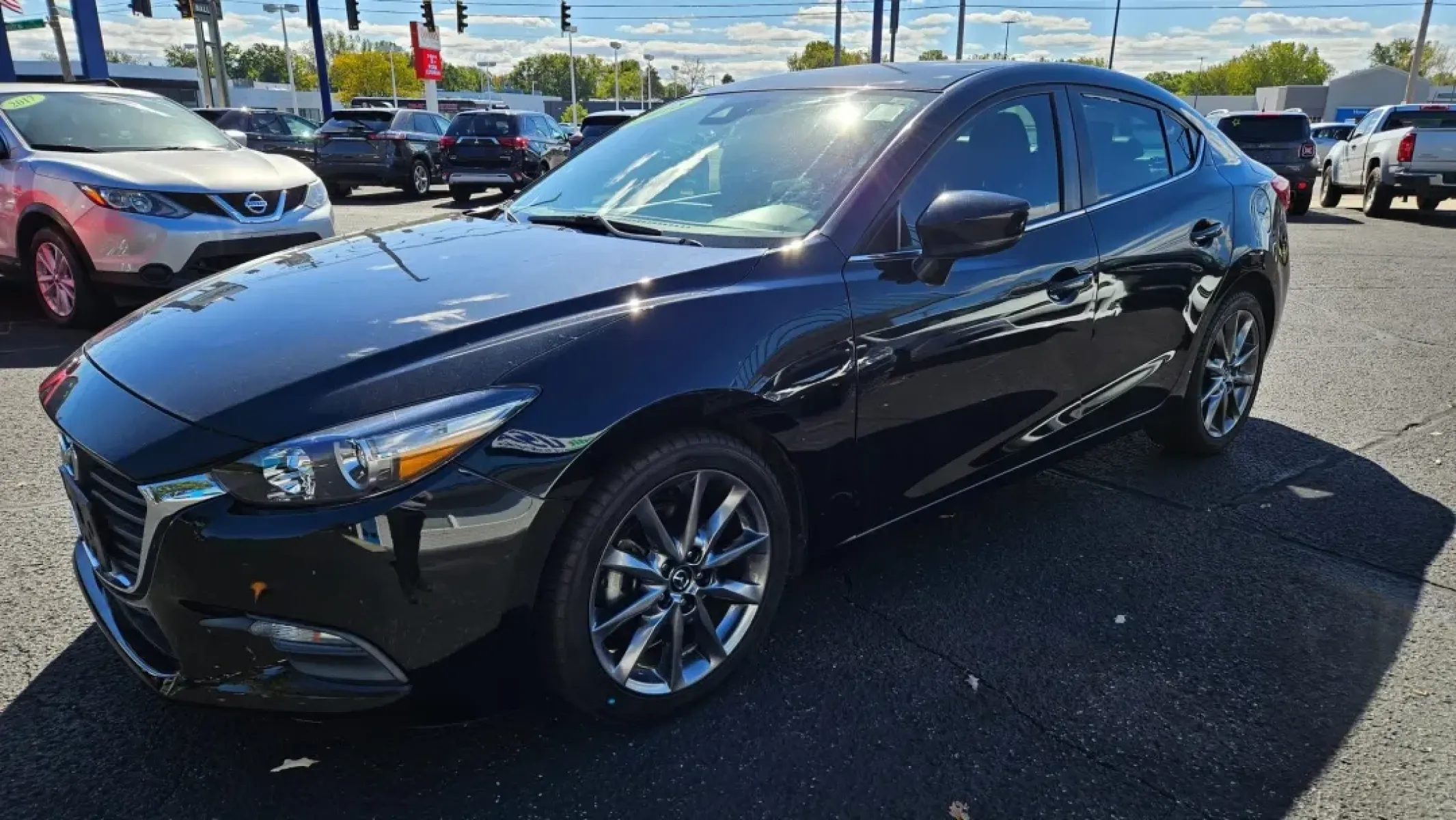 2018 Mazda MAZDA3 TOURING (3MZBN1V30JM) with an Other engine, located at 5744 Central Avenue, Toledo, OH, 43615, (419) 724-0130, 41.676781, -83.682137 - Are you seeking an ideal vehicle for your daily commute or weekend adventures without the pressure of high monthly payments? Look no further than this sleek 2018 Mazda MAZDA3 Touring, available now at Auto Credit in Toledo, OH. Designed for budget-conscious buyers, this sedan combines style, comfort - Photo#2