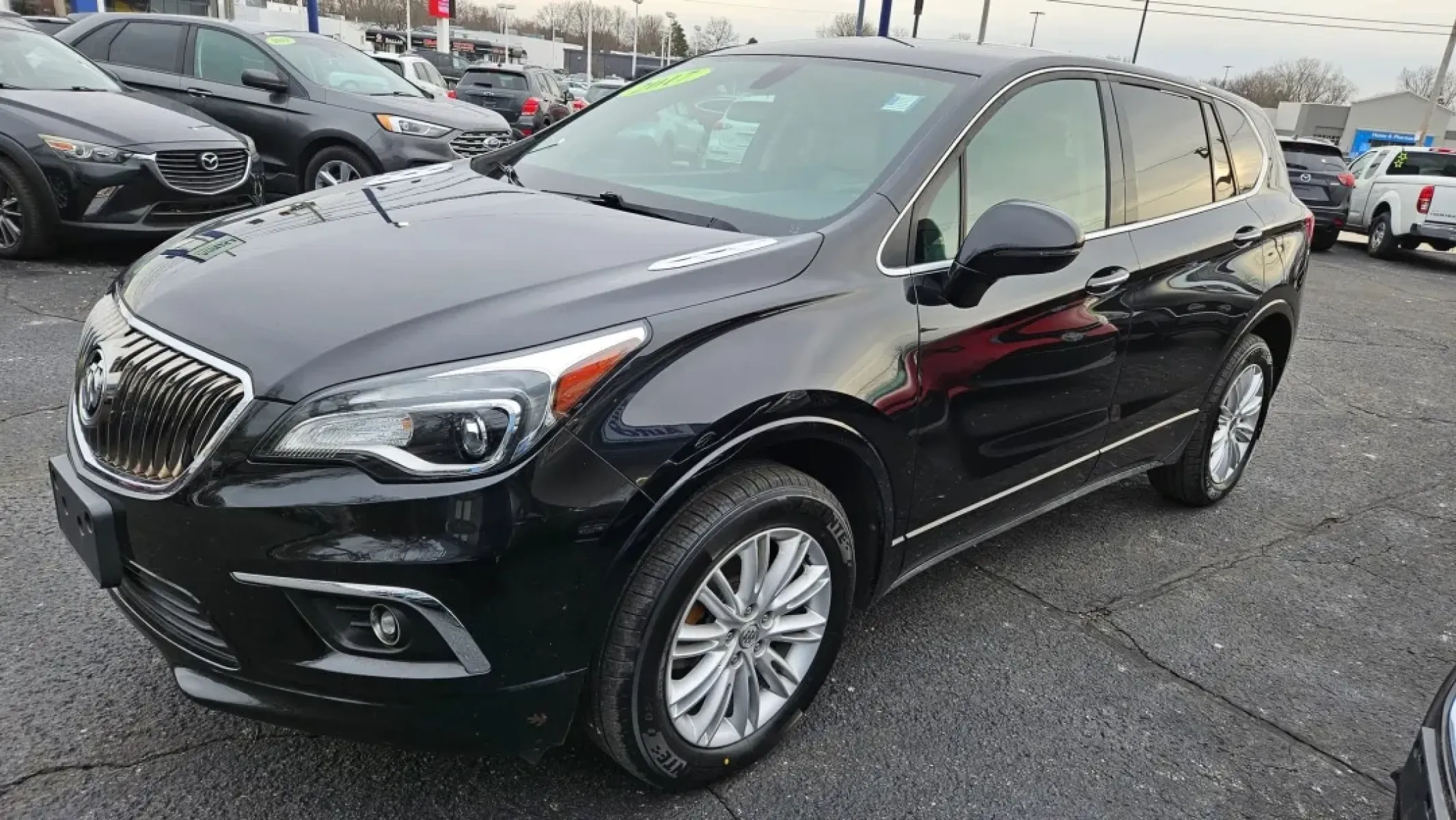 2017 Buick ENVISION (LRBFXCSA2HD) with an Other engine, located at 5744 Central Avenue, Toledo, OH, 43615, (419) 724-0130, 41.676781, -83.682137 - **Discover Your Ideal Ride: 2017 Buick Envision in Toledo, OH**<br /> <br /> Are you ready to elevate your driving experience? Look no further than this stunning 2017 Buick Envision, perfect for your weekend adventures or daily commutes! With a sleek black exterior and a spacious interior, this SUV - Photo#1