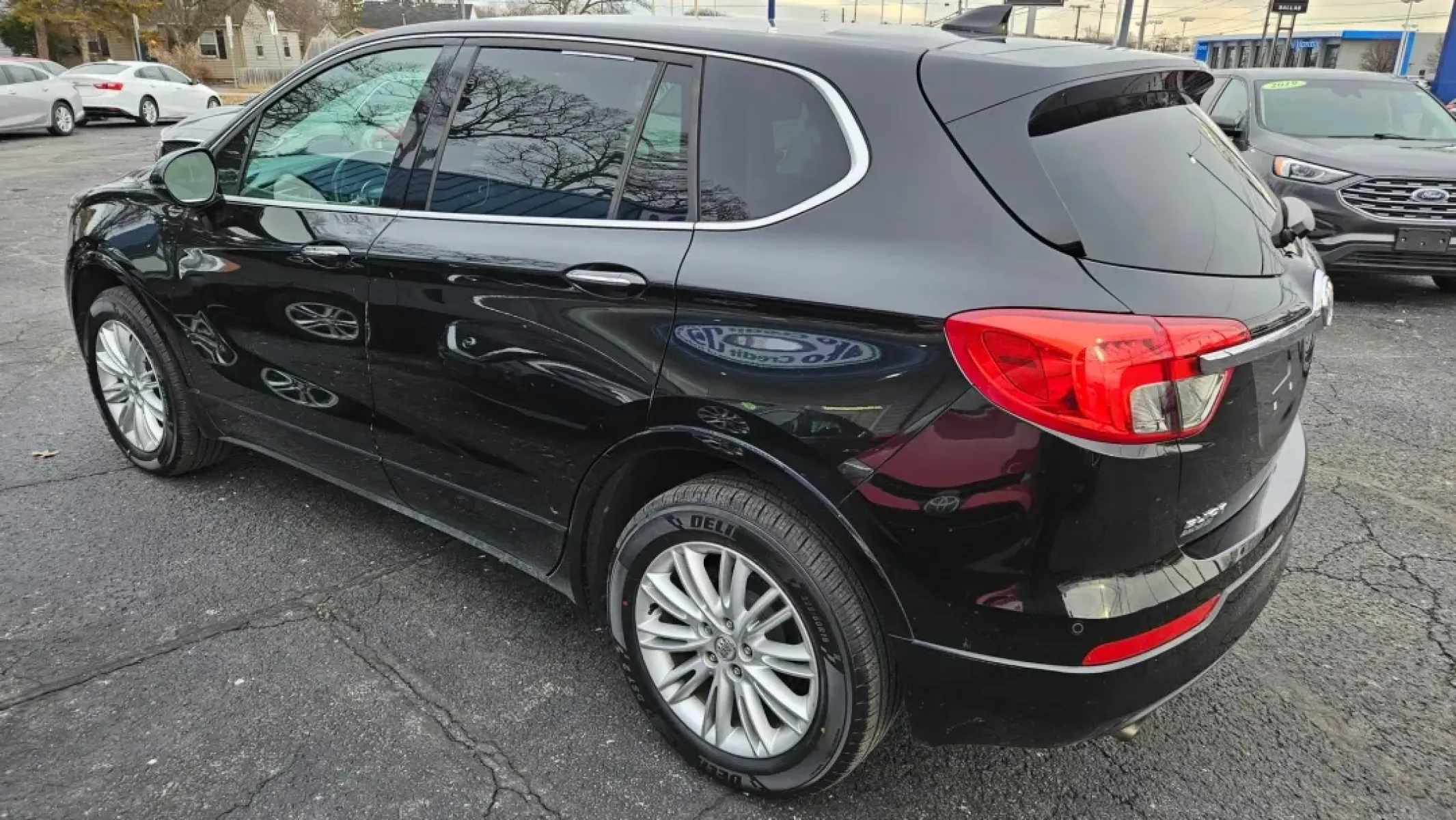 2017 Buick ENVISION (LRBFXCSA2HD) with an Other engine, located at 5744 Central Avenue, Toledo, OH, 43615, (419) 724-0130, 41.676781, -83.682137 - **Discover Your Ideal Ride: 2017 Buick Envision in Toledo, OH**<br /> <br /> Are you ready to elevate your driving experience? Look no further than this stunning 2017 Buick Envision, perfect for your weekend adventures or daily commutes! With a sleek black exterior and a spacious interior, this SUV - Photo#2