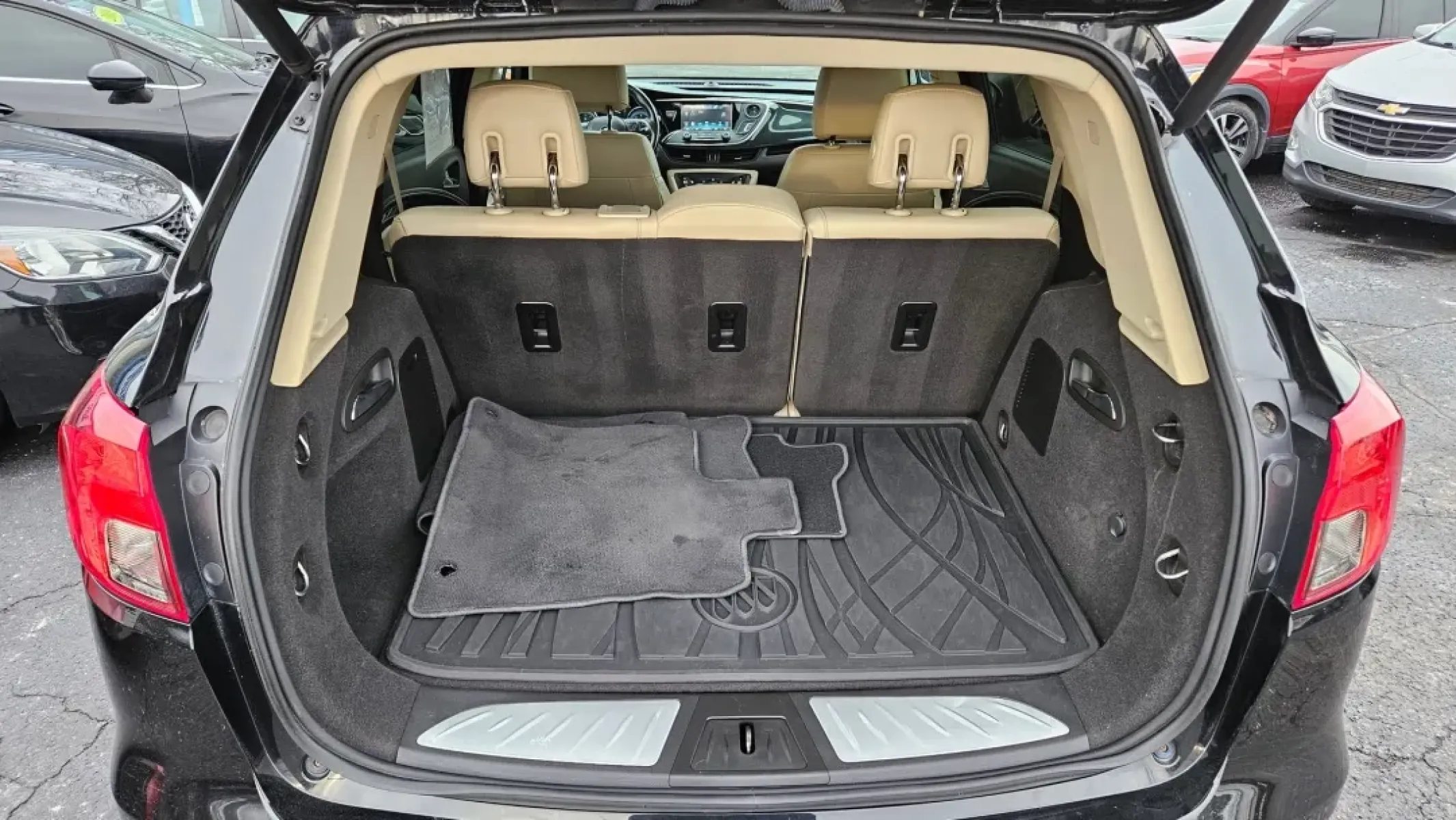 2017 Buick ENVISION (LRBFXCSA2HD) with an Other engine, located at 5744 Central Avenue, Toledo, OH, 43615, (419) 724-0130, 41.676781, -83.682137 - **Discover Your Ideal Ride: 2017 Buick Envision in Toledo, OH**<br /> <br /> Are you ready to elevate your driving experience? Look no further than this stunning 2017 Buick Envision, perfect for your weekend adventures or daily commutes! With a sleek black exterior and a spacious interior, this SUV - Photo#4