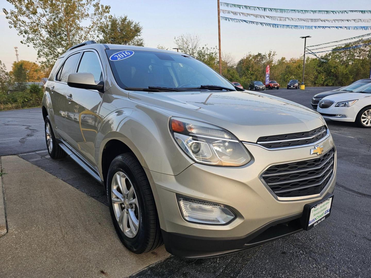 2016 GOLD /BLACK CHEVROLET EQUINOX LT AWD (1GNFLFEK1GZ) with an 2.4L L4 DOHC 16V FFV engine, 6A transmission, located at 502 South Main Street, Columbia City, IN, 46725, (260) 244-4645, 41.151382, -85.490578 - 2016 CHEVROLET EQUINOX LT AWD - Photo#2